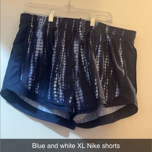 White and blue Nike shirt